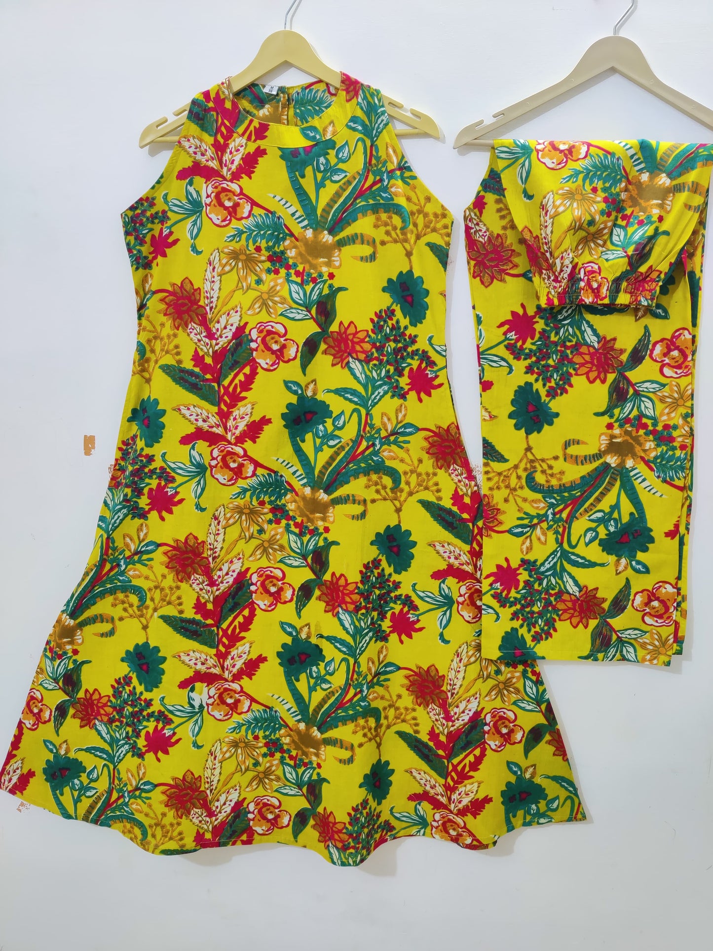 Yellow Cotton Floral Print Sleeveless Kurta And Pant Set For Women